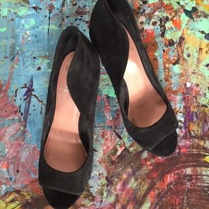 Black suede open toe pumps by Vince Camuto